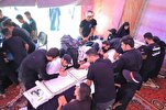 Arbaeen Pilgrims Write Down Quran to Respond to Desecrations