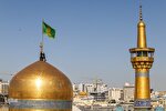 عکس | آیین تعویض پرچم گنبد حرم مطهر رضوی